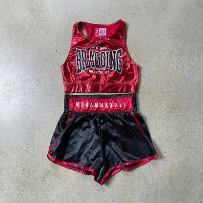 Women junior's Muhammad Ali boxing costume featuring a red tank top and matching shorts from Rex Distributor, Inc.