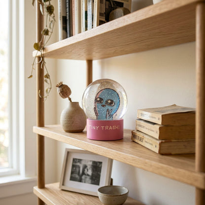 Strange Planet Tiny Trash Snow Globe collectible accessory by Rex Distributor, Inc., featuring a miniature snow globe with quirky design.
