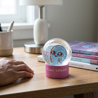 Strange Planet Tiny Trash Snow Globe collectible accessory by Rex Distributor, Inc., featuring a miniature snow globe with quirky design.