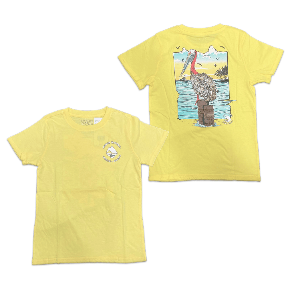 Boy’s yellow Ocean Coast Pelican graphic T-shirt by Rex Distributor, Inc., featuring a coastal pelican design on a bright yellow shirt.
