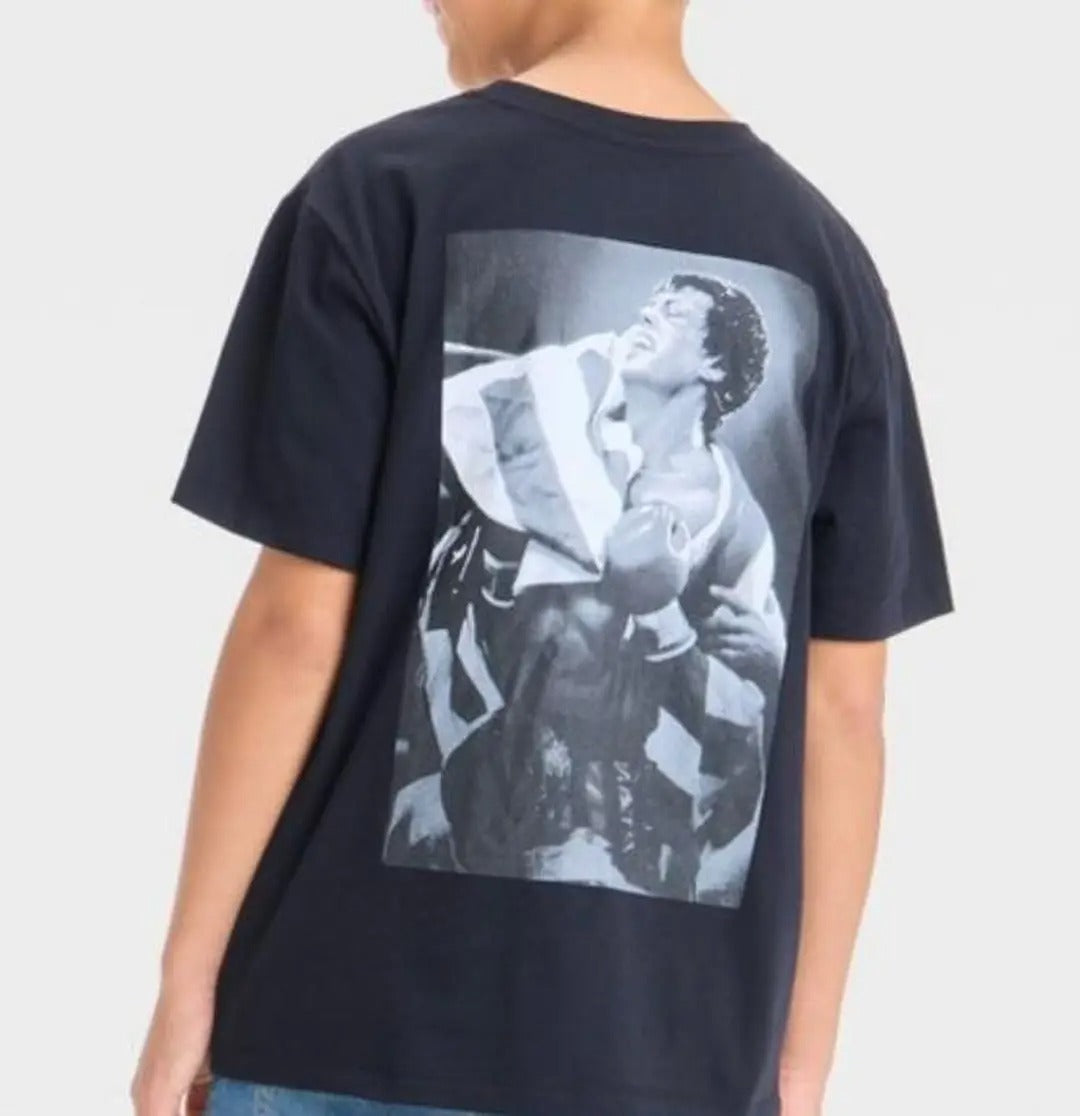 Black boys' Rocky Balboa graphic T-shirt by Mad Engine featuring a bold boxer image and short sleeves.