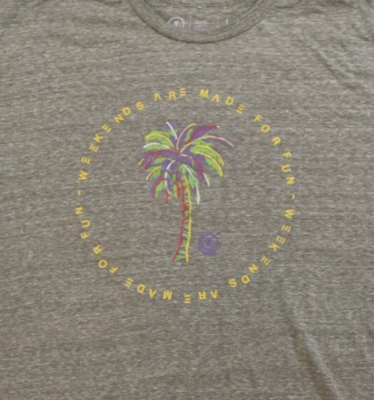 Gray t-shirt with a palm tree and text design on a plain background