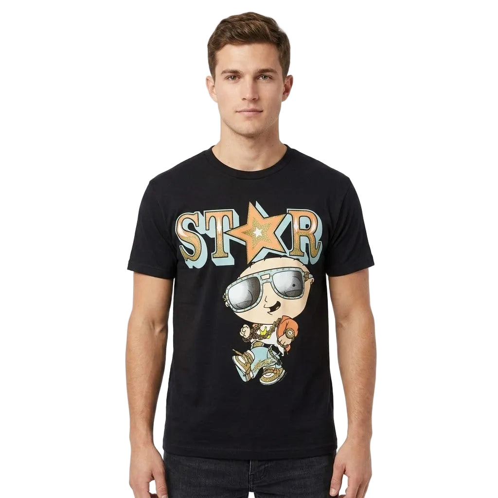 A man wearing a black graphic t-shirt with a cartoon character and the word 'STAR' printed on the front, set against a plain white background.